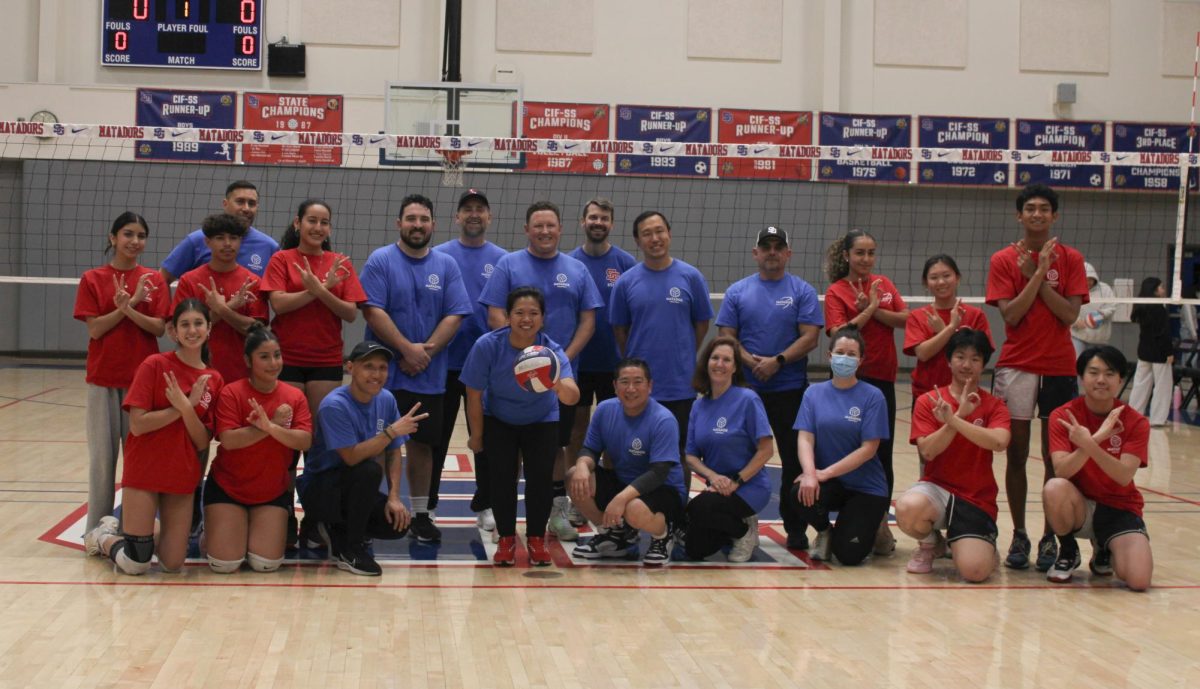 Photo courtesy of Kellyn Chea. San Gabriel High School’s Class of 2026 seniors pose with school staff after competing in an intense game of volleyball. 